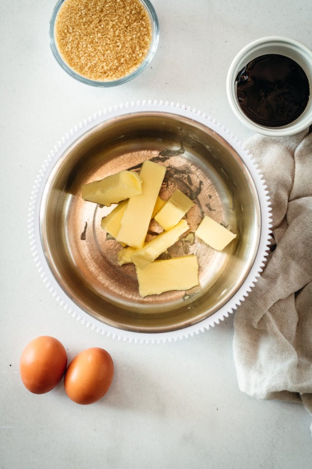 Overhead view of butter in mixing bowl